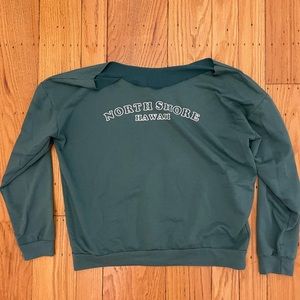 CUT off the shoulder crew neck